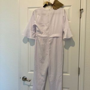 White jumpsuit Lucca high on top to collar sleeves to mid arm with bell design